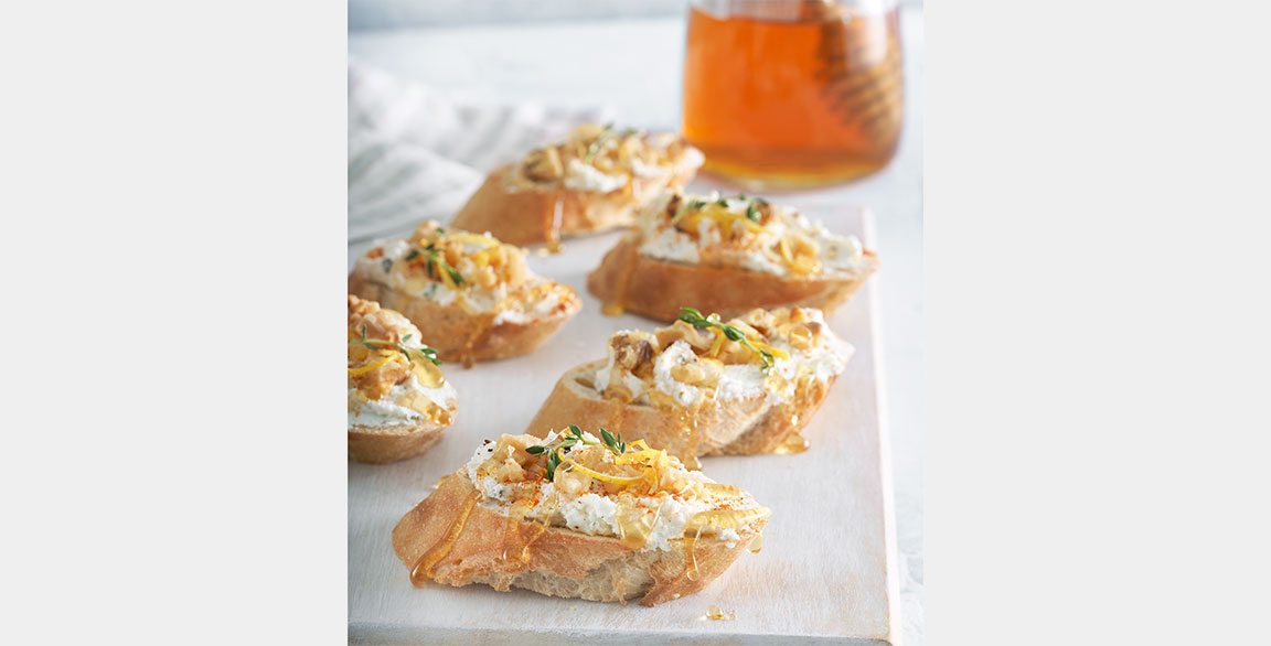 Honey, Herb Goat Cheese & Walnut Crostini
