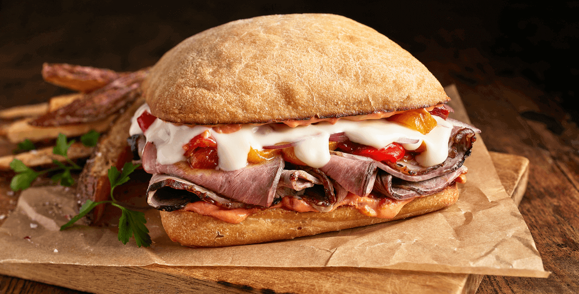 Roasted Aussie Lamb Sandwich with Fontina, Sweet Peppers and Harissa Mayo