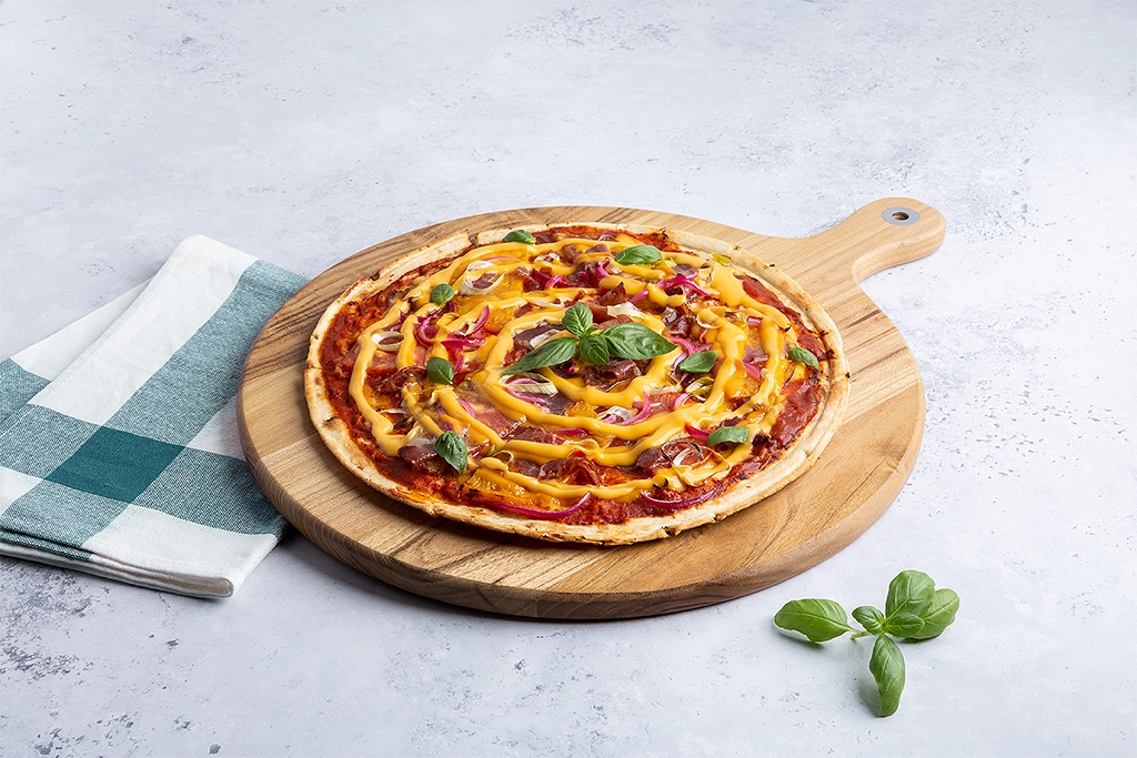 Modern Pizza Builds Start With Sauce