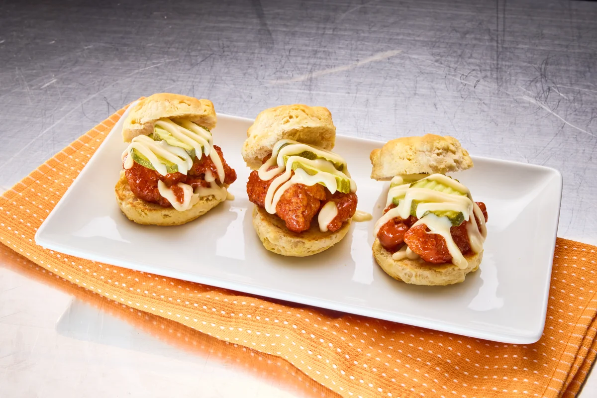 Muy Fresco® Monterey Jack Cheese Sauce is the perfect flavor pair for Nashville Hot Chicken Sliders. Used here as a drizzle, serve it as a dip to leverage today’s trends.