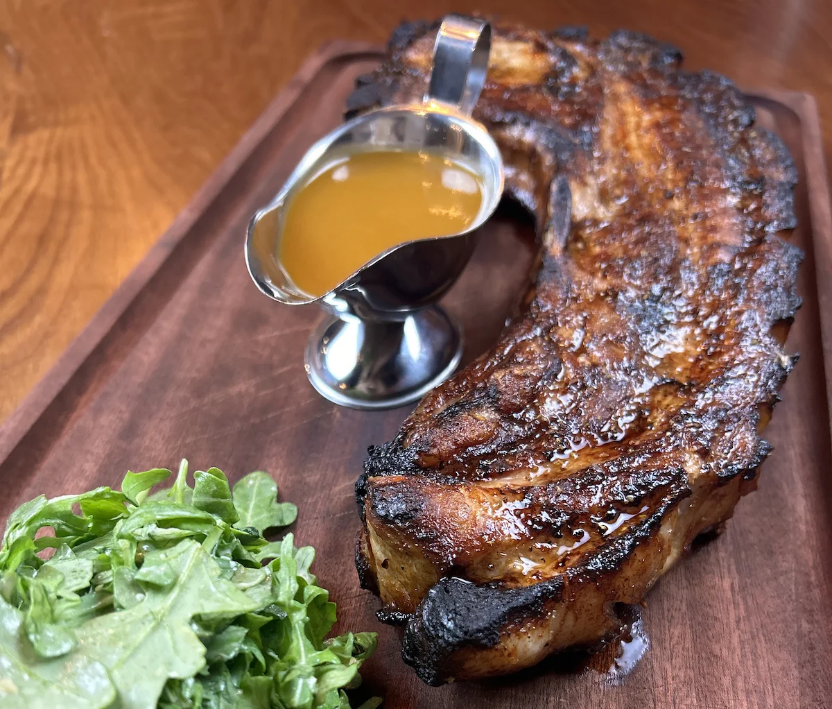 When presenting the Porchetta Chop, servers will educate diners on the preparation and highlight the various cuts while carving